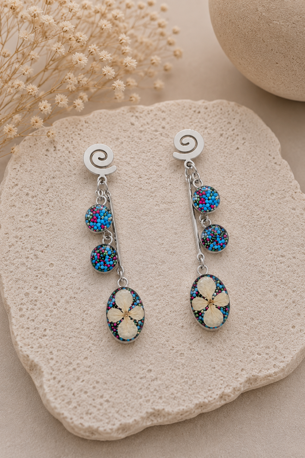 Aretes Inocencia
