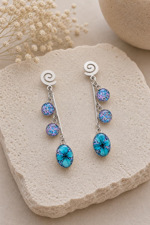 Aretes Inocencia